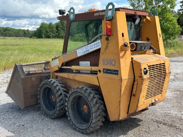 1382930-3 Case 1840 Skid Steer Loader with Two Buckets and Forks