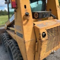 1382930-24 Case 1840 Skid Steer Loader with Two Buckets and Forks