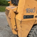 1382930-35 Case 1840 Skid Steer Loader with Two Buckets and Forks