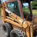 1382930-37 Case 1840 Skid Steer Loader with Two Buckets and Forks