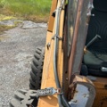1382930-38 Case 1840 Skid Steer Loader with Two Buckets and Forks