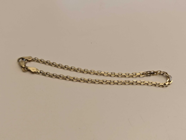 1130290-18 Parti med smycken i guld