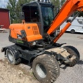 1410018-10 Hjulgrävare, Doosan DX55W med tillbehör -2015