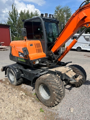 1410018-10 Hjulgrävare, Doosan DX55W med tillbehör -2015