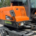 1410018-59 Hjulgrävare, Doosan DX55W med tillbehör -2015
