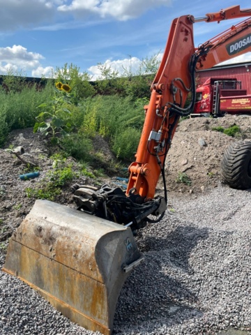 1410018-62 Hjulgrävare, Doosan DX55W med tillbehör -2015