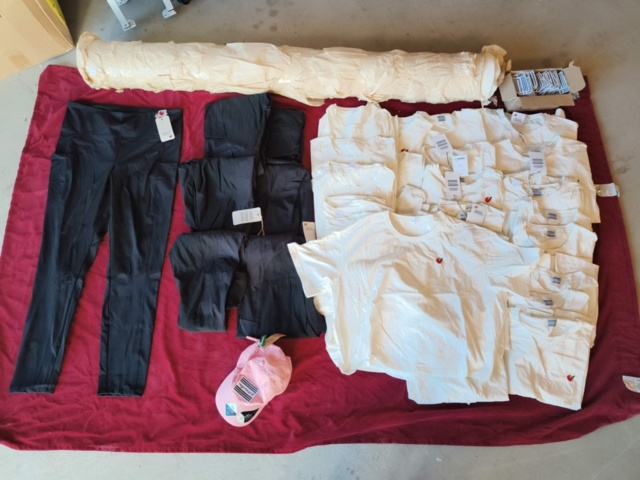 1331914-1 Clothing section with t-shirts and pants