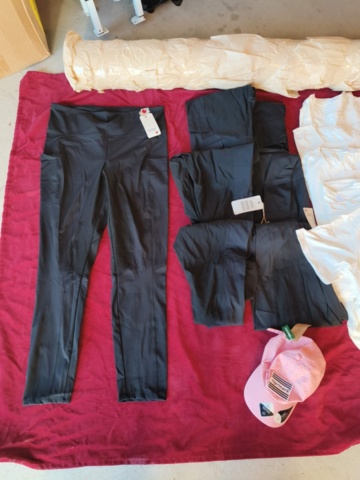 1331914-5 Clothing section with t-shirts and pants