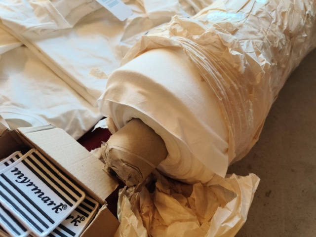 1331914-9 Clothing section with t-shirts and pants