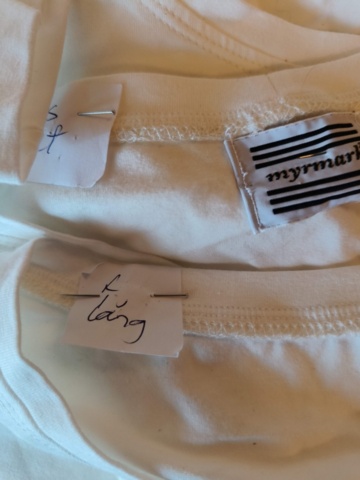 1331914-14 Clothing section with t-shirts and pants