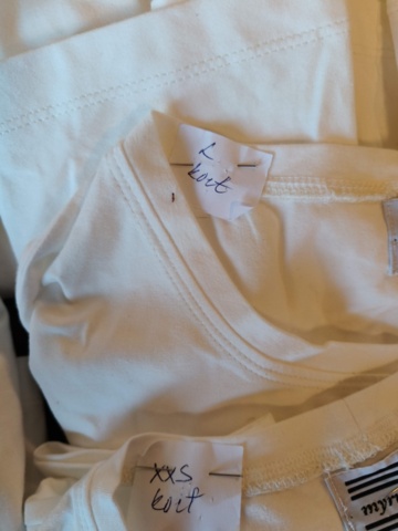 1331914-15 Clothing section with t-shirts and pants