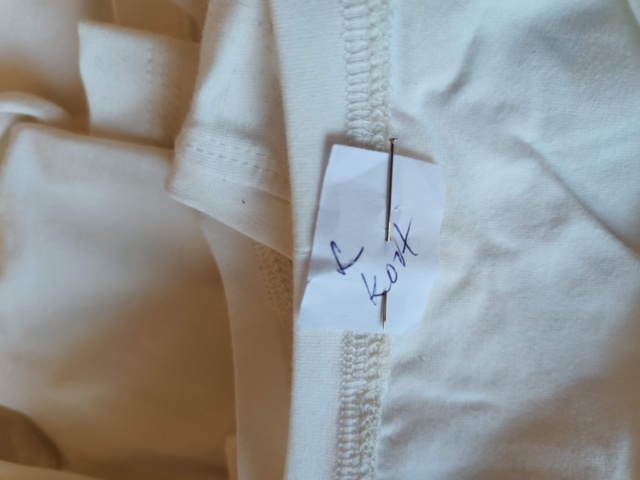 1331914-17 Clothing section with t-shirts and pants