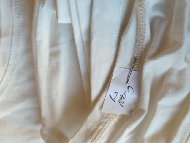 1331914-18 Clothing section with t-shirts and pants