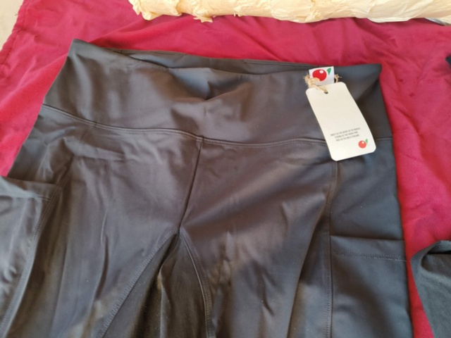 1331914-21 Clothing section with t-shirts and pants