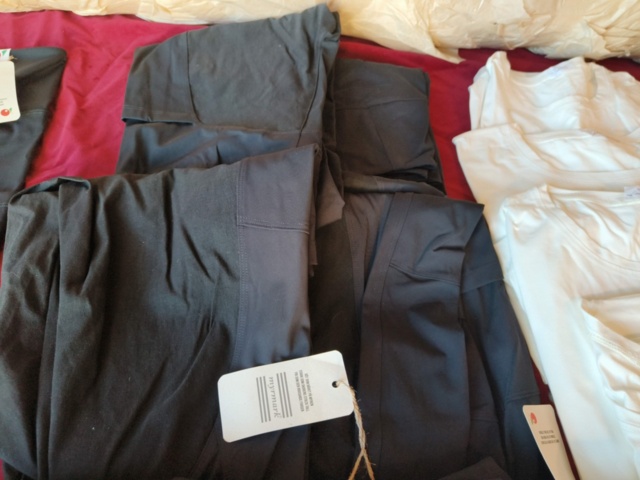 1331914-25 Clothing section with t-shirts and pants