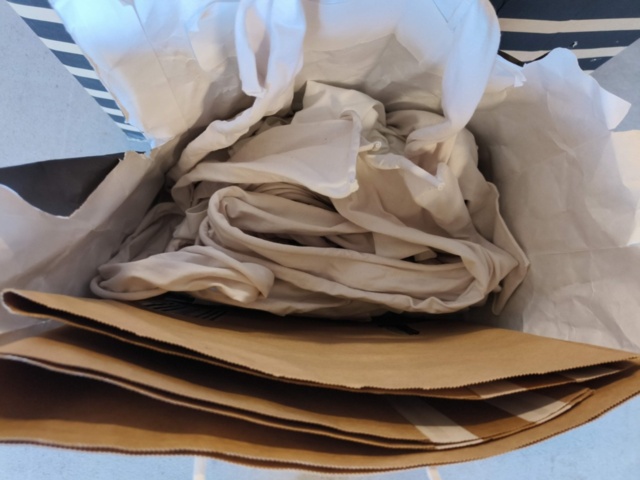 1331914-27 Clothing section with t-shirts and pants