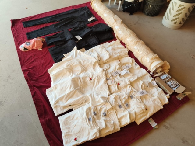 1331914-28 Clothing section with t-shirts and pants