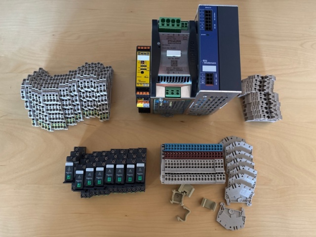 Collection of electrical components - relays, I/O modules, connection ...