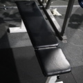 1403935-11 Bench press station with bar and weights