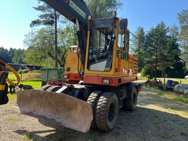 1437806-10 Hjulgrävare Åkerman H7Mc -88 "Miljömotor" 14627 tim med skopor