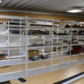 1416652-3 Sheet metal storage shelves.