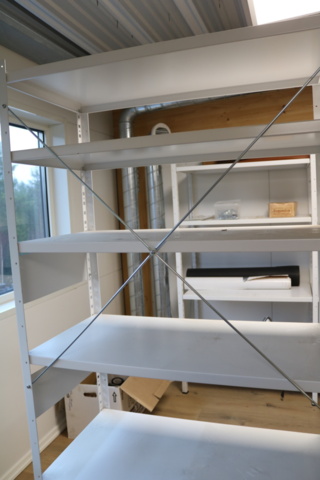 1416652-4 Sheet metal storage shelves.