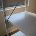 1416652-5 Sheet metal storage shelves.
