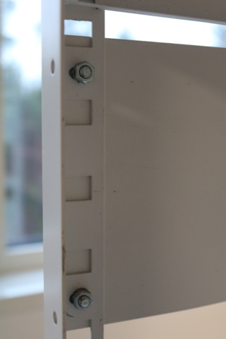 1416652-7 Sheet metal storage shelves.