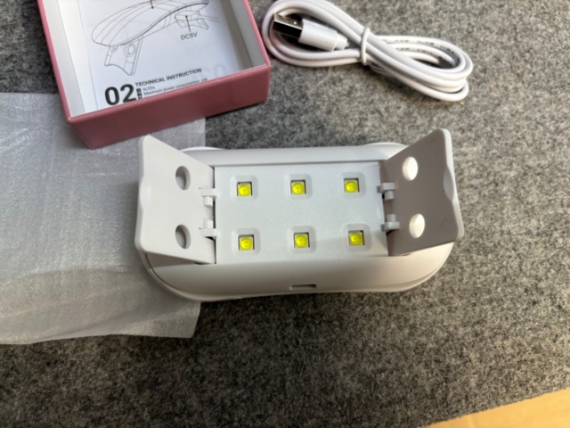 1438026-7 Parti med diverse nagelprodukter och förpackningsmaterial