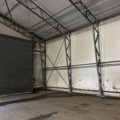 1305233-15 Tälthall om ca: 300m2 monterad mot byggnad – med portar och belysning