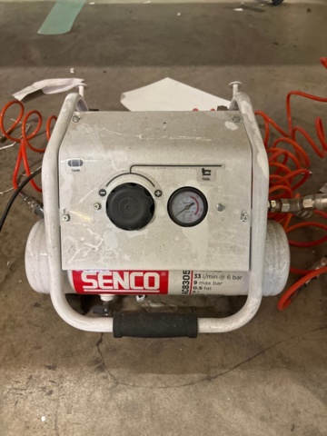 1436168-4 Application table with sign roller, including cutting tool and compressor