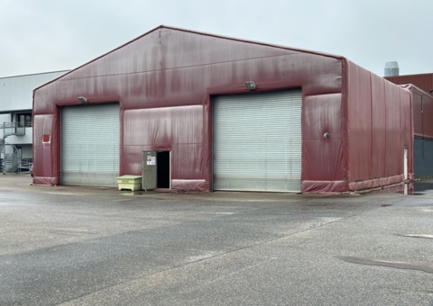 Divestment of tent hall and car paint shop