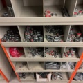 1388813-10 Large plumbing warehouse, storage shelves, trolleys according to the pictures