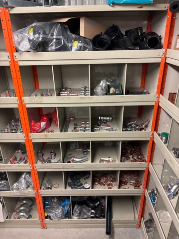 1388813-11 Large plumbing warehouse, storage shelves, trolleys according to the pictures