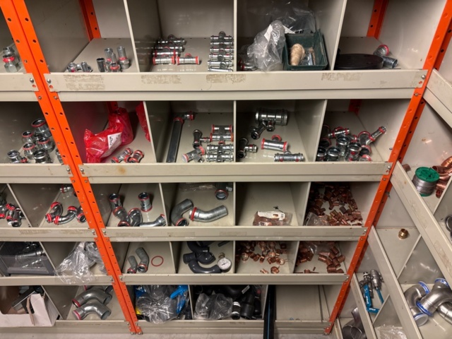 1388813-12 Large plumbing warehouse, storage shelves, trolleys according to the pictures