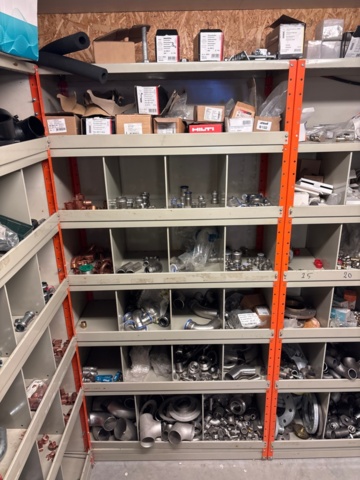 1388813-13 Large plumbing warehouse, storage shelves, trolleys according to the pictures
