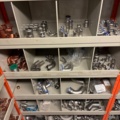 1388813-14 Large plumbing warehouse, storage shelves, trolleys according to the pictures