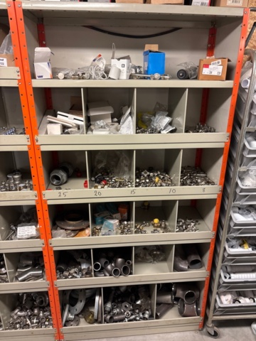 1388813-15 Large plumbing warehouse, storage shelves, trolleys according to the pictures