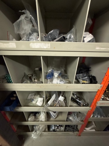 1388813-22 Large plumbing warehouse, storage shelves, trolleys according to the pictures