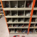 1388813-24 Large plumbing warehouse, storage shelves, trolleys according to the pictures