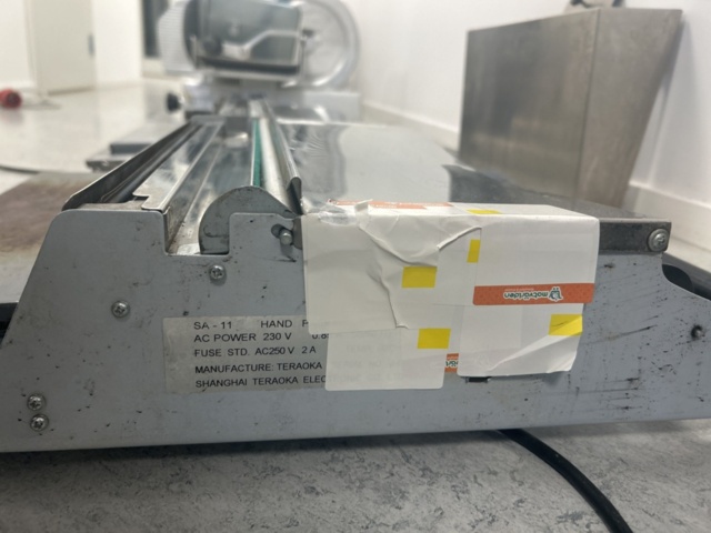 1429965-3 Manuell bordsmonterad plastfilmsförpackare