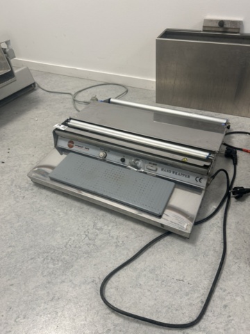 1429966-1 Professionell bänkmonterad plastfilmsförpackare