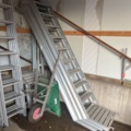 1431508-7 Various ladders, aluminum scaffolding steps, wheelbarrows, etc.
