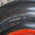 1321216-4 Truck tire with rim 27x10-12