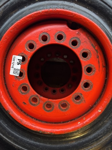 1321216-2 Truck tire with rim 27x10-12