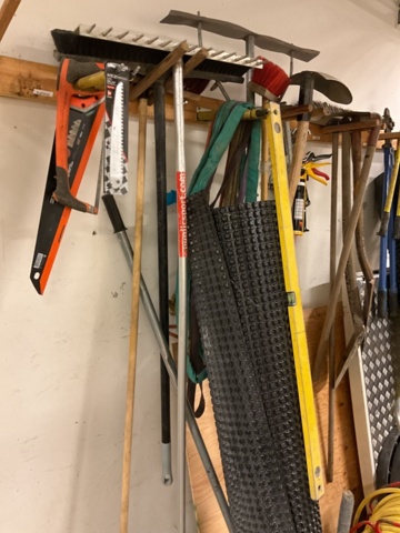 1406901-6 Various utensils and tools on the wall