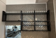 1372730 Wall-mounted glass shelf with wine glasses and champagne glasses