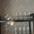 1372732-6 Wall-mounted glass shelf with carafes, glasses and cups