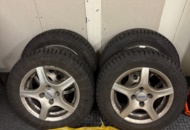 1352446 4 Pirelli studded tires on aluminum rims 175/65 4-hole