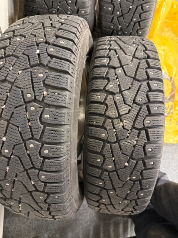 1352446-2 4 Pirelli studded tires on aluminum rims 175/65 4-hole